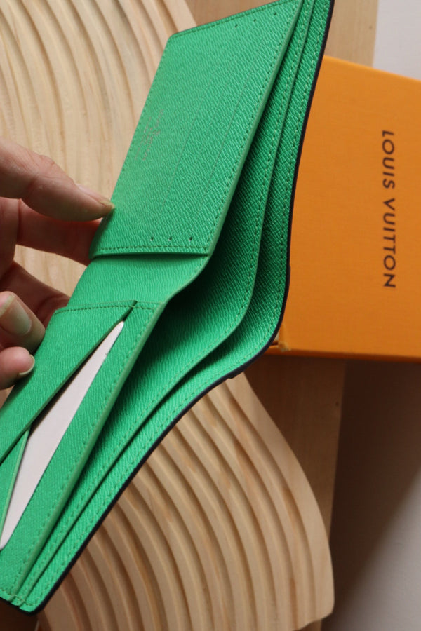 Portafoglio multiplo LV M30995 in tela monogramma verde e pelle Taïga 180059