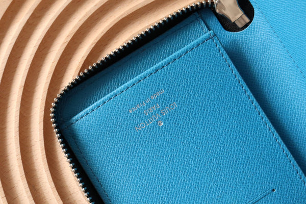 LV Zippy Vertical Wallet Light Blue Monogram Canvas & Taïga Leather 180051
