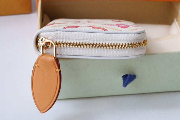 Portamonete LV By the Pool Zippy in tela con stampa a piastrelle monocolore rosa 204710