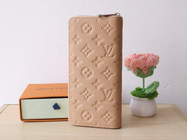 LV Zippy Wallet Vertical Monogram Grained Taurillon Cowhide