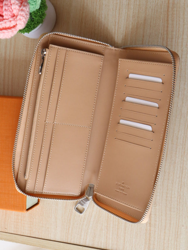 LV Zippy Wallet Vertical Monogram Grained Taurillon Cowhide