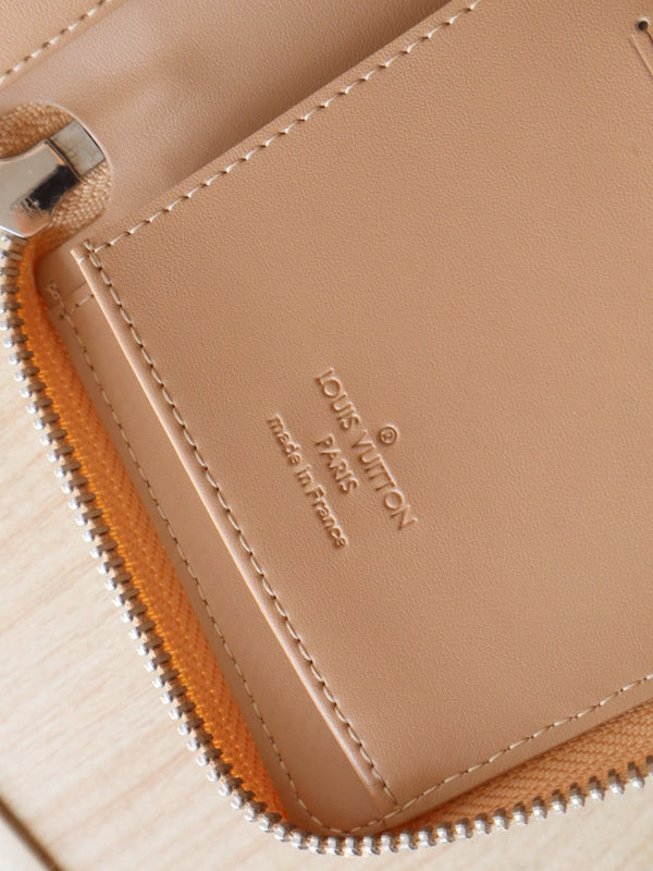 LV Zippy Wallet Vertical Monogram Grained Taurillon Cowhide