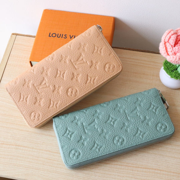 LV Zippy Wallet Vertical Monogram Grained Taurillon Cowhide