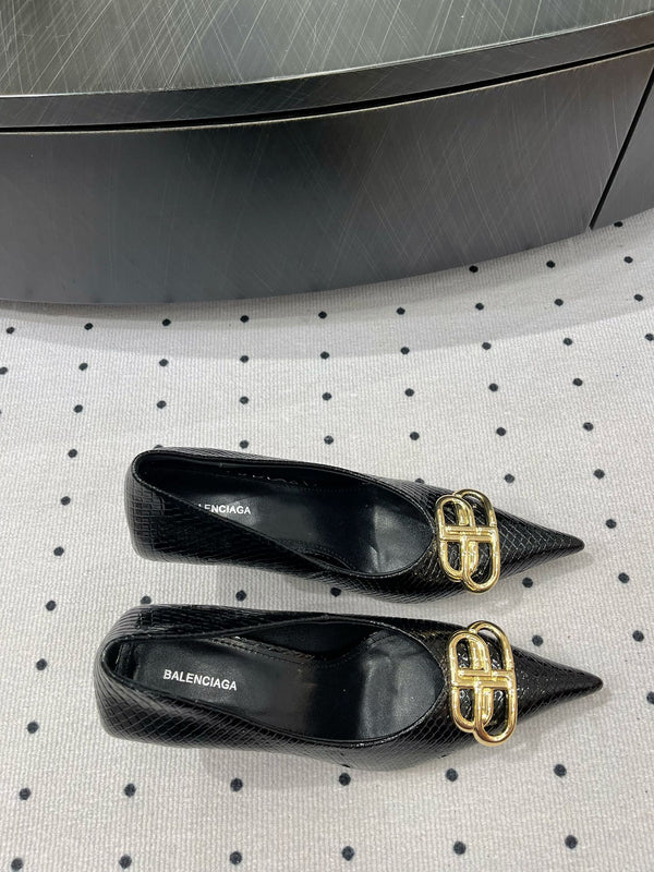 HEELED PUMPS 65 MM IN BLACK LIZARD PATTERN CALFSKIN GOLD HARDWARE