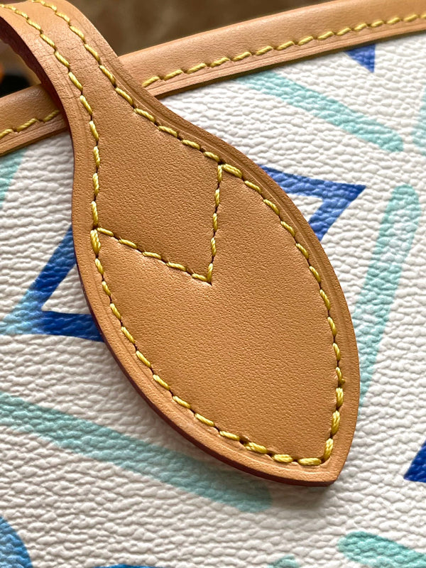 NEVERFULL MM 31 IN TELA CON PIASTRELLE MONOGRAMMA BLU LAGUNA