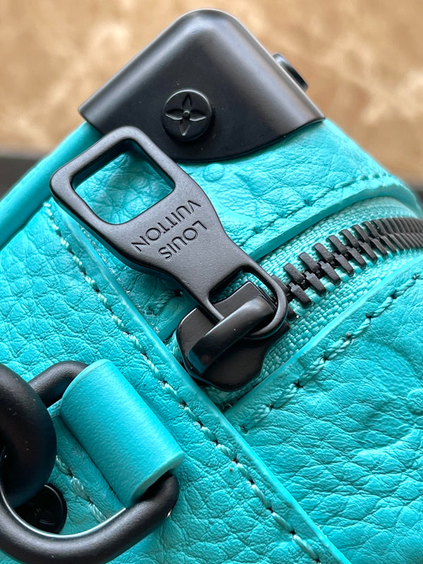 MINI BAULE MORBIDO 18 IN BLU TURCHESE TAURILLON