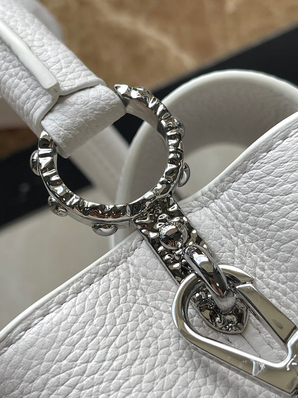 CAPUCINES EAST-WEST MINI 22 IN WHITE CALFSKIN SILVER HARDWARE