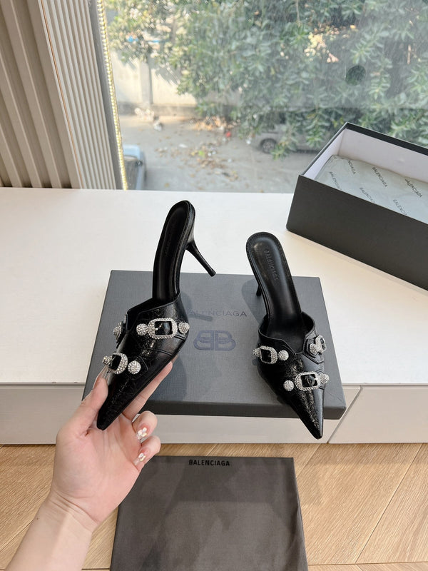 CRYSTAL BUCKLE BLACK WAX-OIL SHEEPSKIN HEELED MULES