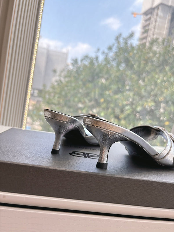 MULES CAGOLE CON TACCO MEDIO IN PELLE DI VITELLO METALLIZZATA ARGENTO