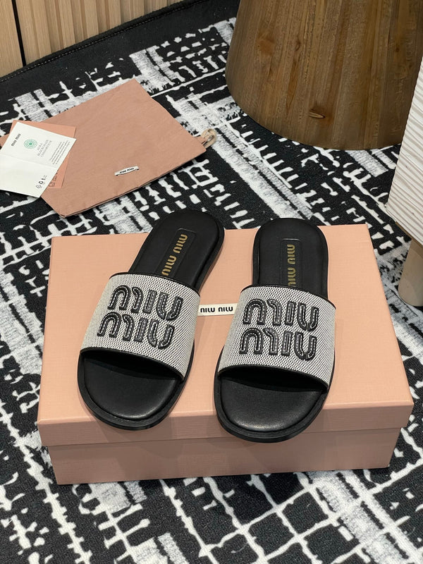 Ciabatte Miu 25S in tela e pelle beige e nera 227133