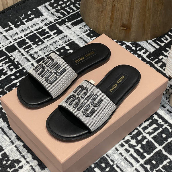 Miu 25S Beige and Black Canvas and leather slides 227133