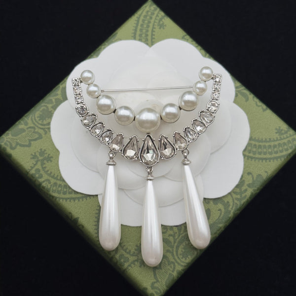 Spilla Gucci in argento 184022