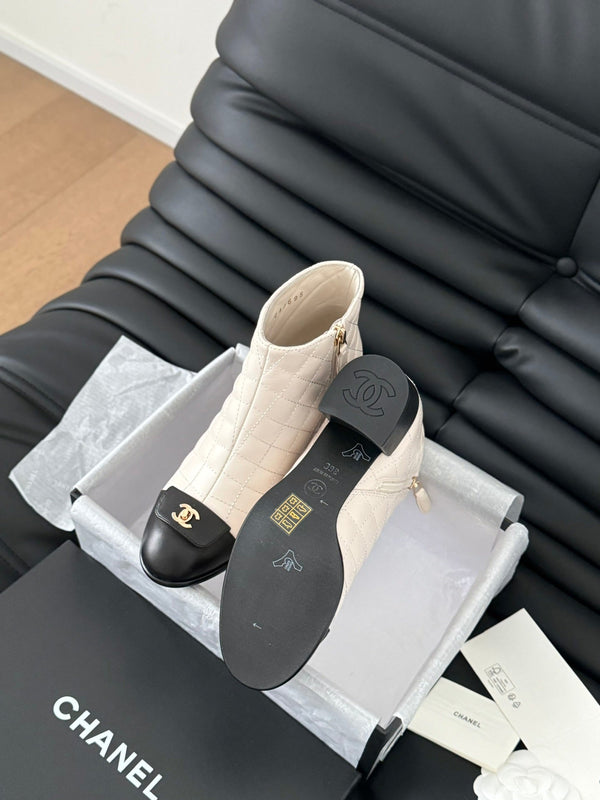 STIVALI CC CORTI 65 MM IN PELLE DI AGNELLO CON MOTIVO TRAPUNTATO BIANCO E NERO