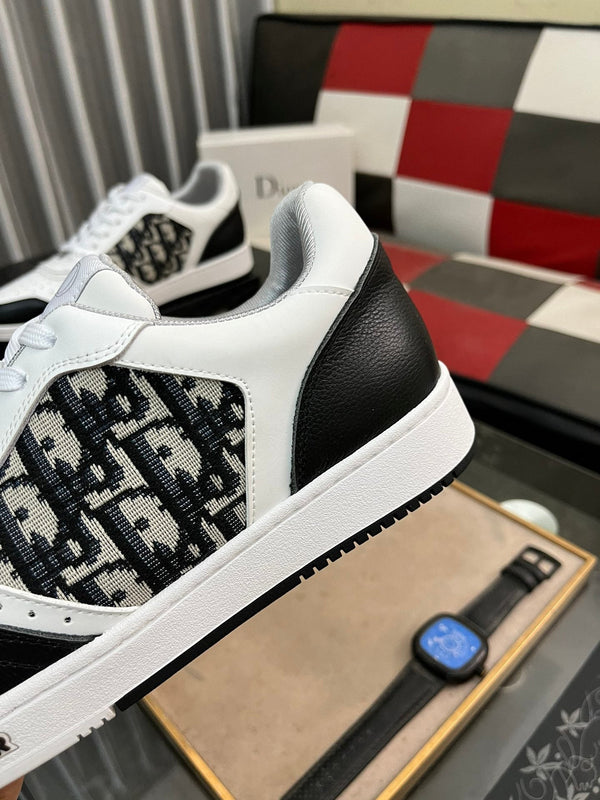 CD B27 SNEAKER BASSA IN PELLE DI VITELLO NERA E BIANCA