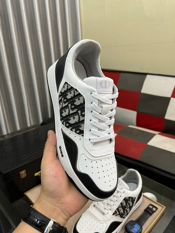 CD B27 SNEAKER BASSA IN PELLE DI VITELLO NERA E BIANCA