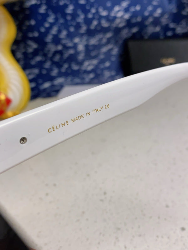 TRIOMPHE SUNGLASS 566216 IN BLACK AND WHITE ACETATE