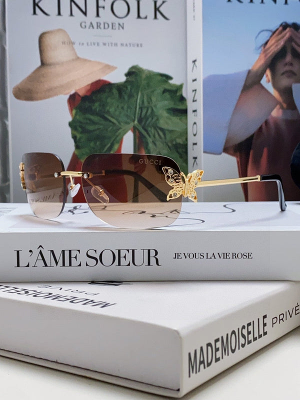 BUTTERFLY EMBELLISHED RIMLESS RECTANGULAR FRAME SUNGLASSES 570245 IN METAL