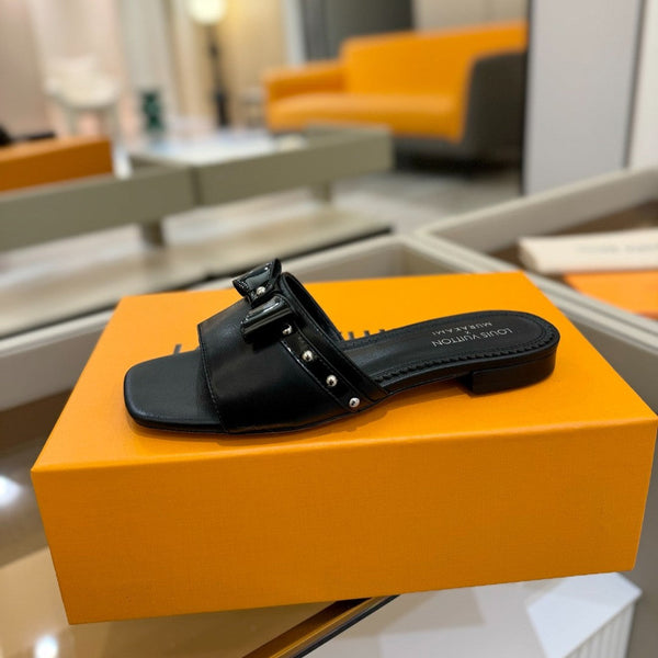 LV x TM 6AM Flat Mule in pelle di pecora nera 241219