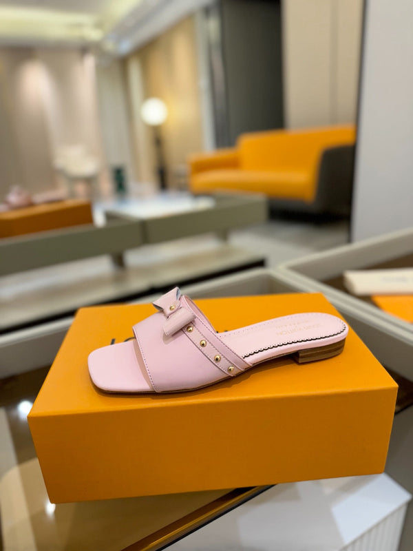 LV x TM 6AM Flat Mule in pelle di pecora rosa 241220