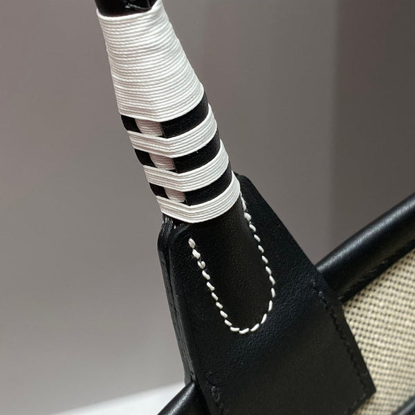 STEEPLE 28 BAG IN OFF-WHITE H CANVAS AND BLACK SWIFT CALFSKIN