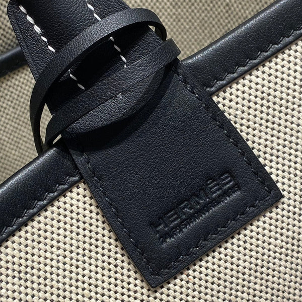 STEEPLE 28 BAG IN OFF-WHITE H CANVAS AND BLACK SWIFT CALFSKIN