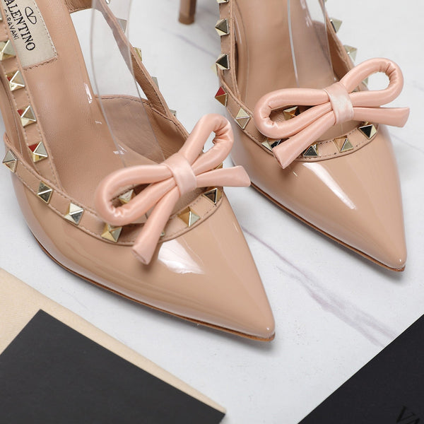 DÉCOLLETÉ ROCKSTUD BOW SLINGBACK IN VERNICE NUDE TAN 95MM