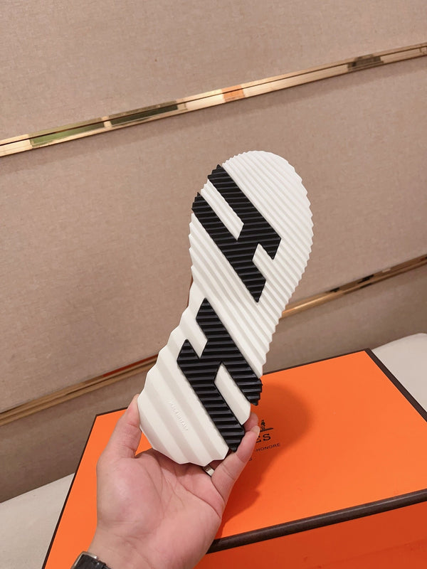 SNEAKER HM BOUNCING IN PELLE DI VITELLO NERA E MARRONE