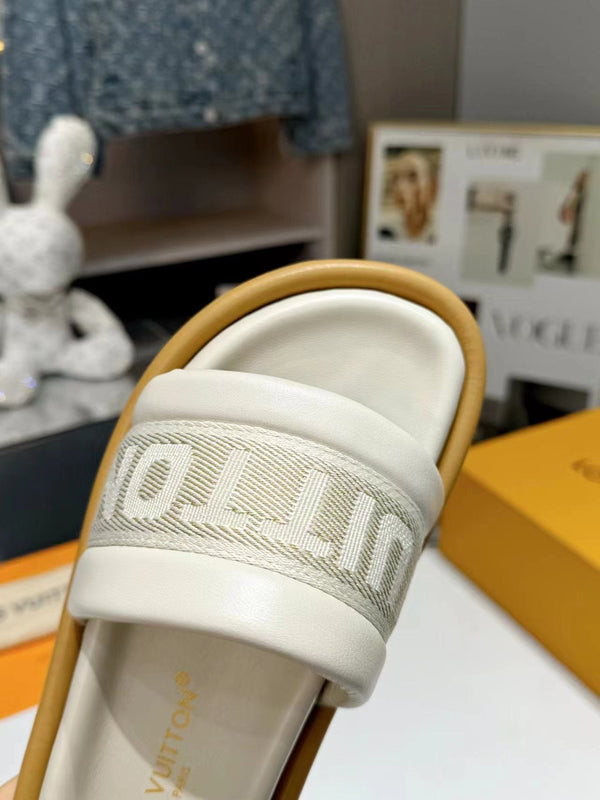 lv bliss flat mule cream canvas calfskin