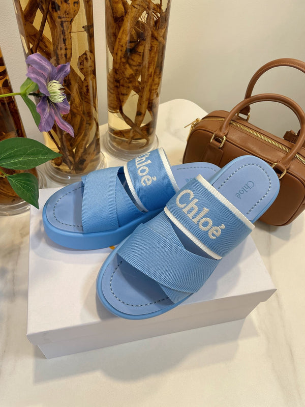 CHLOÉ WOODY WEDGE SANDALS IN CERULEAN BLUE CANVAS WITH RUBBER SOLE