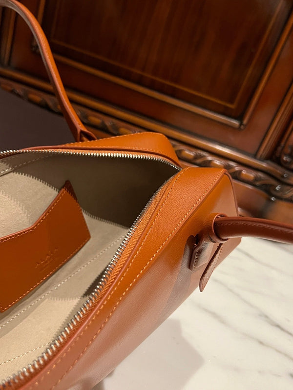 LE TECKEL MEDIUM BAG 33 IN BRONZE ORANGE GOATSKIN