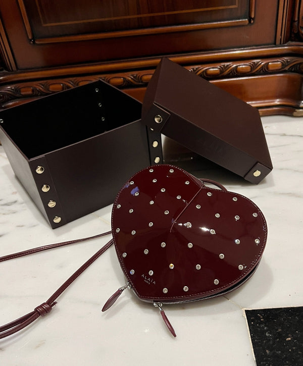 LE COEUR BAG 21 IN BURGUNDY RED PATENT CALFSKIN ATTACHED STRASS