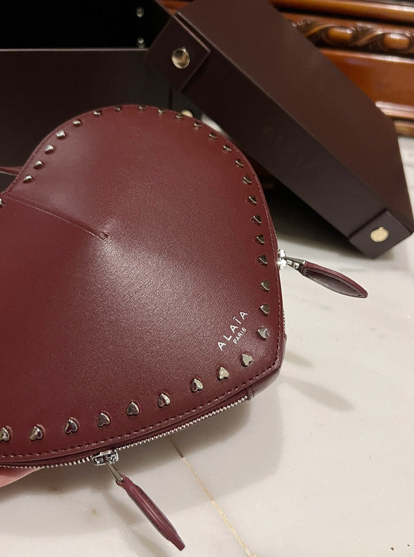 LE COEUR BAG 21 IN BURGUNDY RED CALFSKIN WITH STUDDED HEART