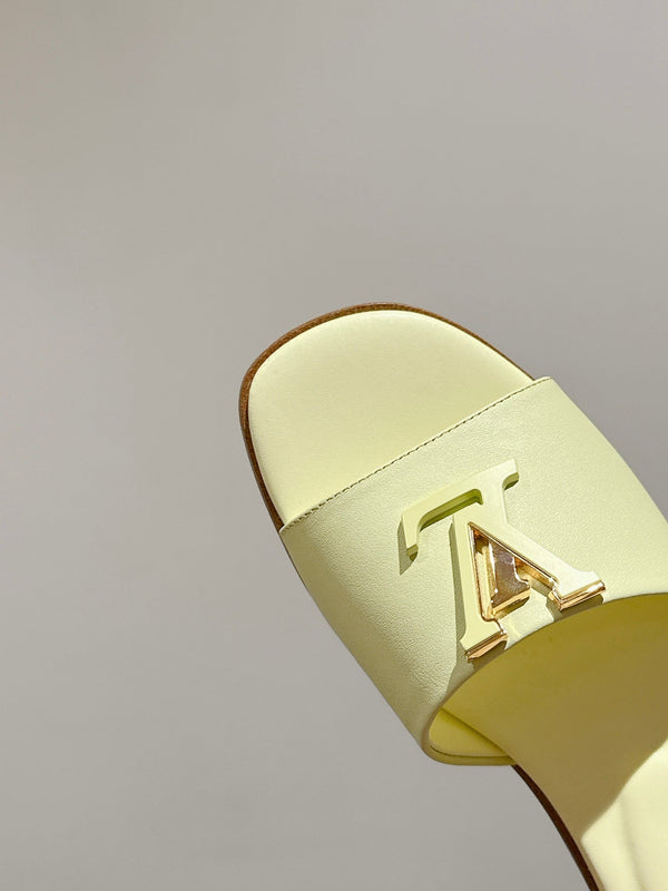 lv capri flat mule pastel yellow calfskin