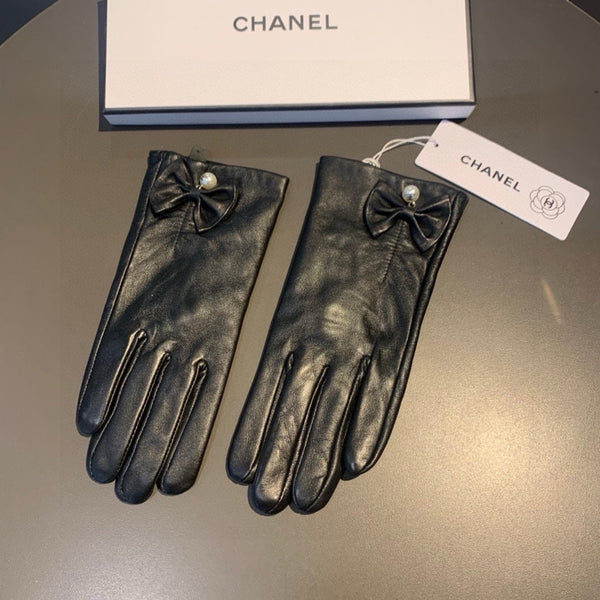 GUANTI TOUCHSCREEN IN PELLE DI AGNELLO NERA CON LOGO ORO 462264