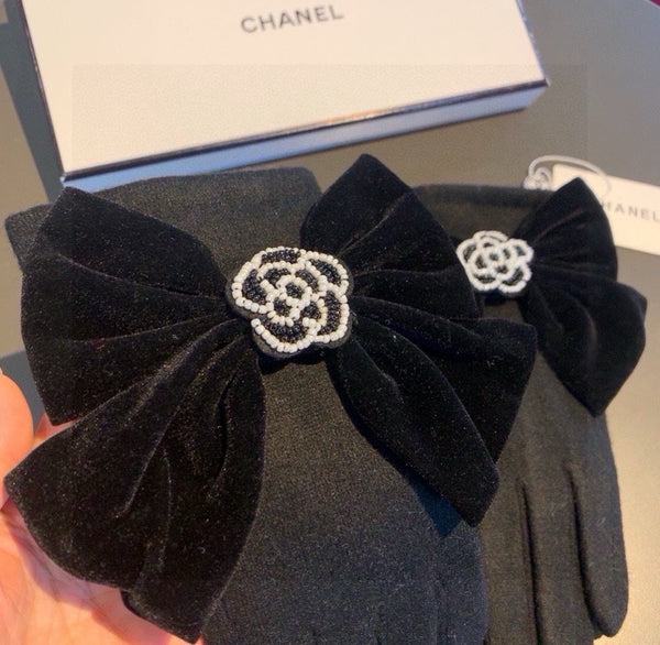 GUANTI IN LANA NERA CON FIOCCO GRANDE 464996