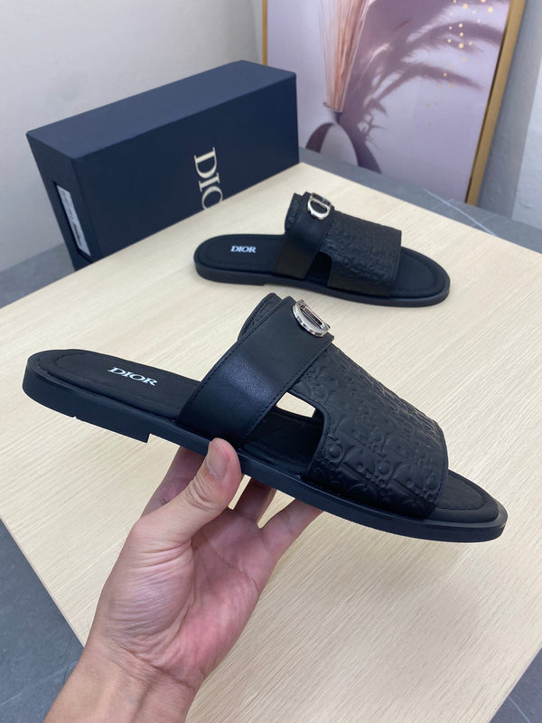 SANDALO SLIDE CUT CON SIMBOLO CD IN PELLE NERA