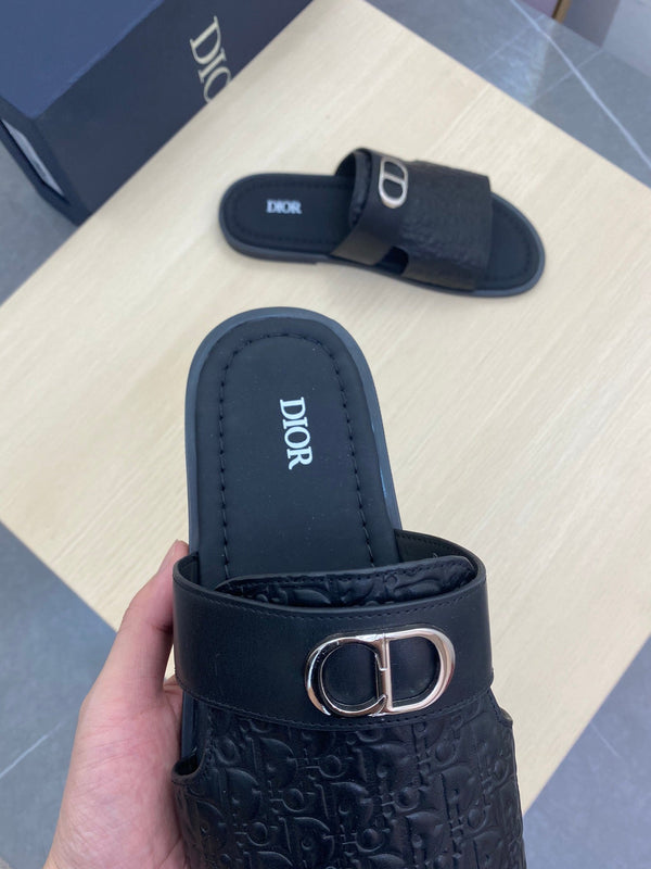 SANDALO SLIDE CUT CON SIMBOLO CD IN PELLE NERA