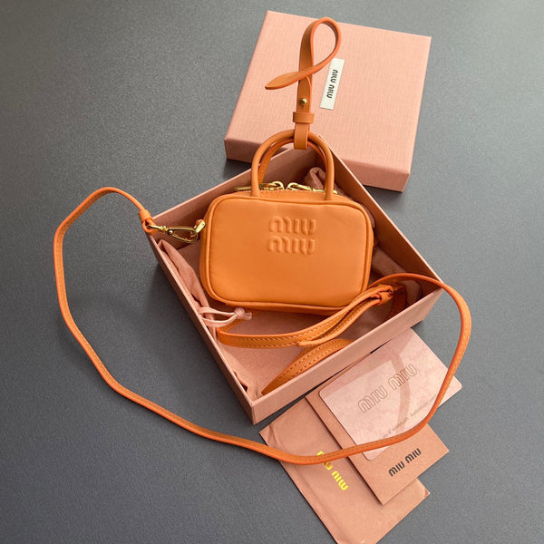 Miu 11 Orange Beau Leather Micro Bag 240361