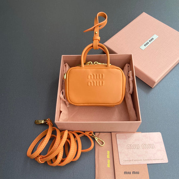 Miu 11 Orange Beau Leather Micro Bag 240361