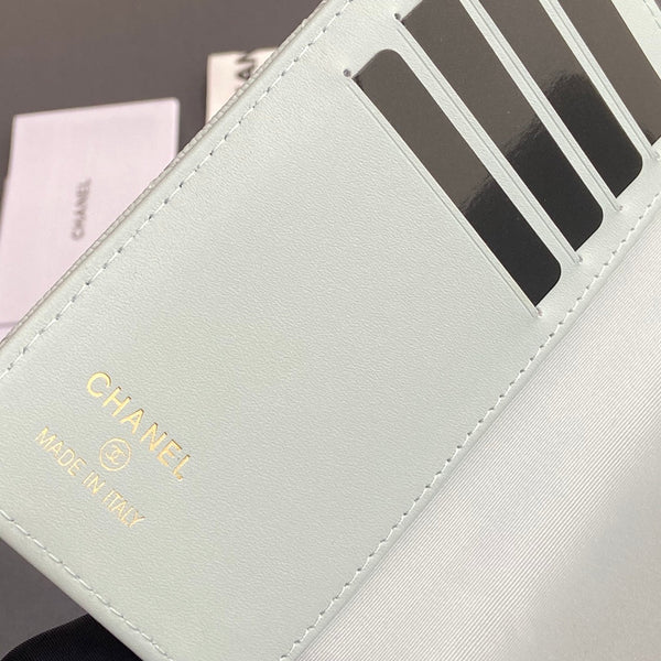 CC Passport Holder Light Blue Caviar 234701