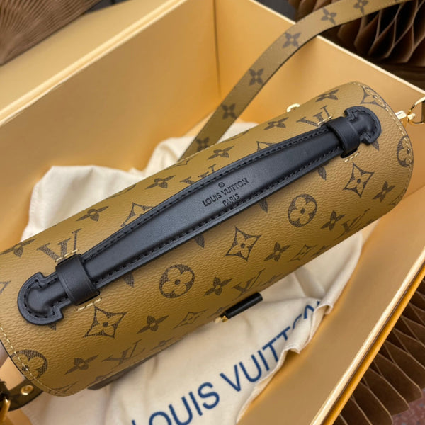 pochette metis 25 monogram reverse canvas