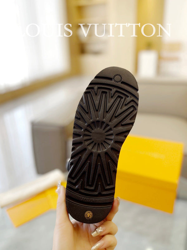 Stivaletto con plateau LV Aspen in pelle scamosciata nera