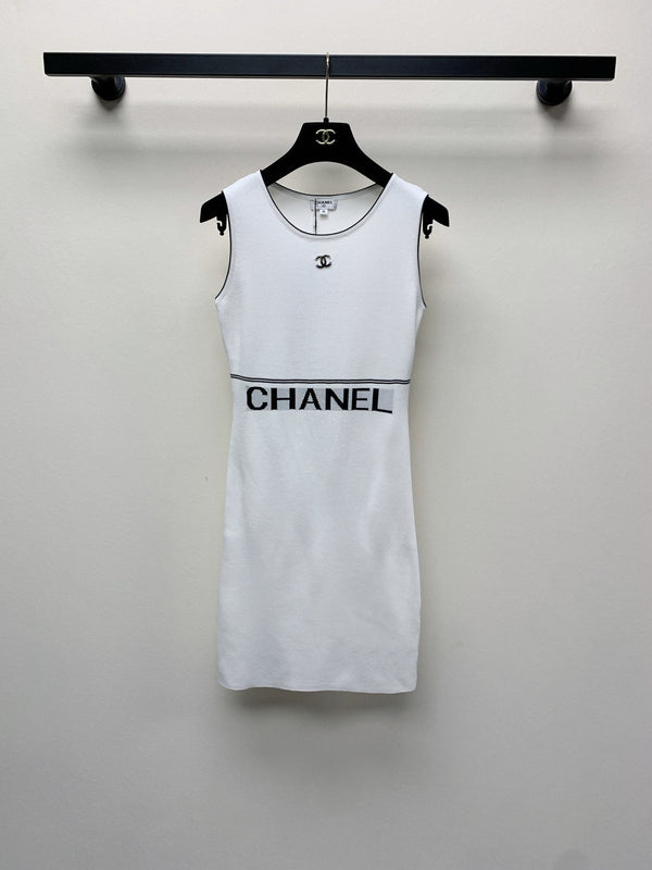 CC 25 Round Neck Knitted Embroidered Logo Vest Dress in White 277584