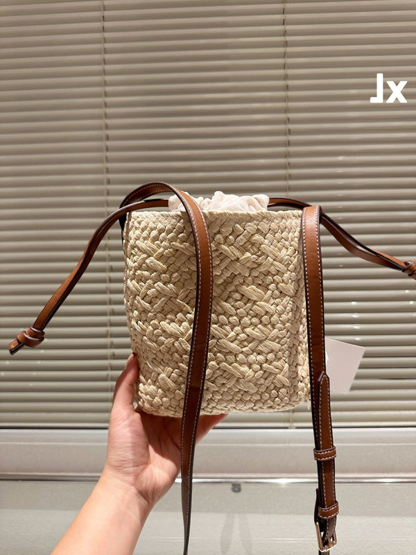 LOE ANAGRAM MINI 18 BUCKET BAG IN NATURAL RAFFIA