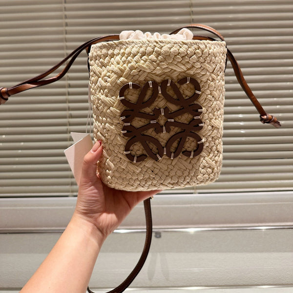 LOE ANAGRAM MINI 18 BUCKET BAG IN NATURAL RAFFIA