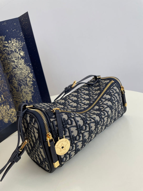 CD East-West cylindrical bag 27 blue jacquard canvas