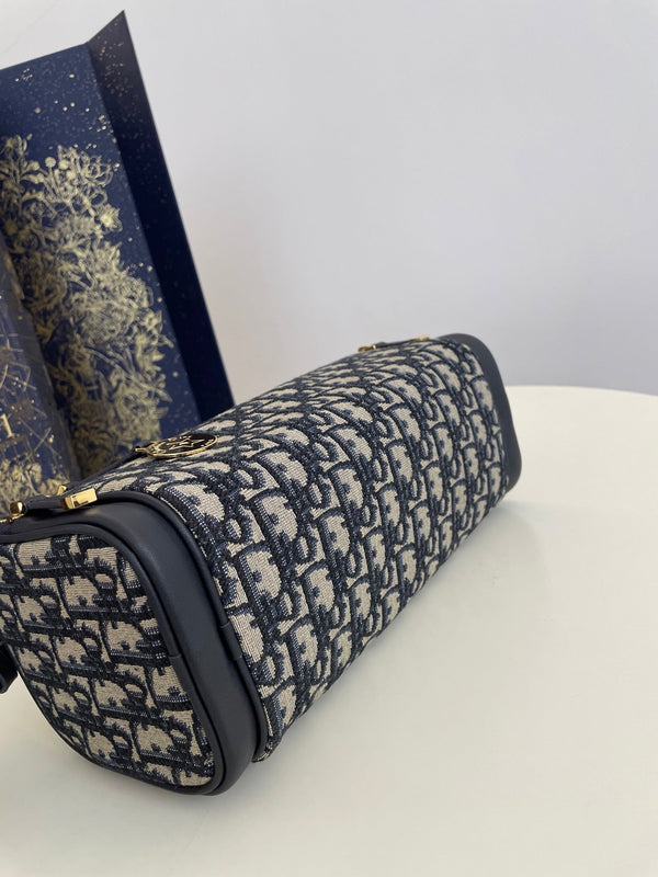 CD East-West cylindrical bag 27 blue jacquard canvas