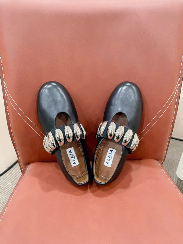 ALAIA TRIBALE BALLET FLATS IN BLACK LAMBSKIN