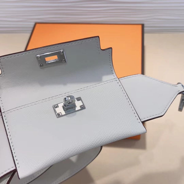 Tracolla Kelly Pocket 50mm in pelle Epsom bianca con hardware in argento