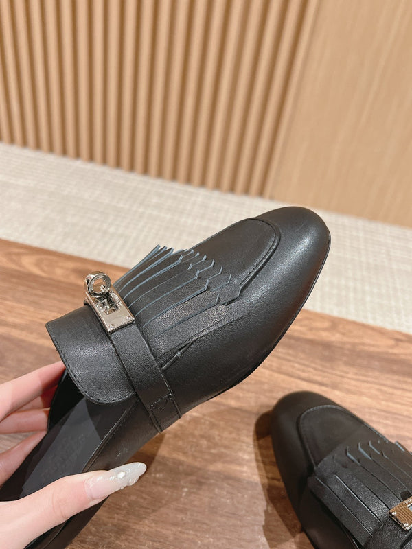 OZ Mule con frange nere